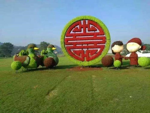 仿真綠雕也可以做沙發(fā)的樣子哦 鴛鴦婚慶仿真綠雕批發(fā)價